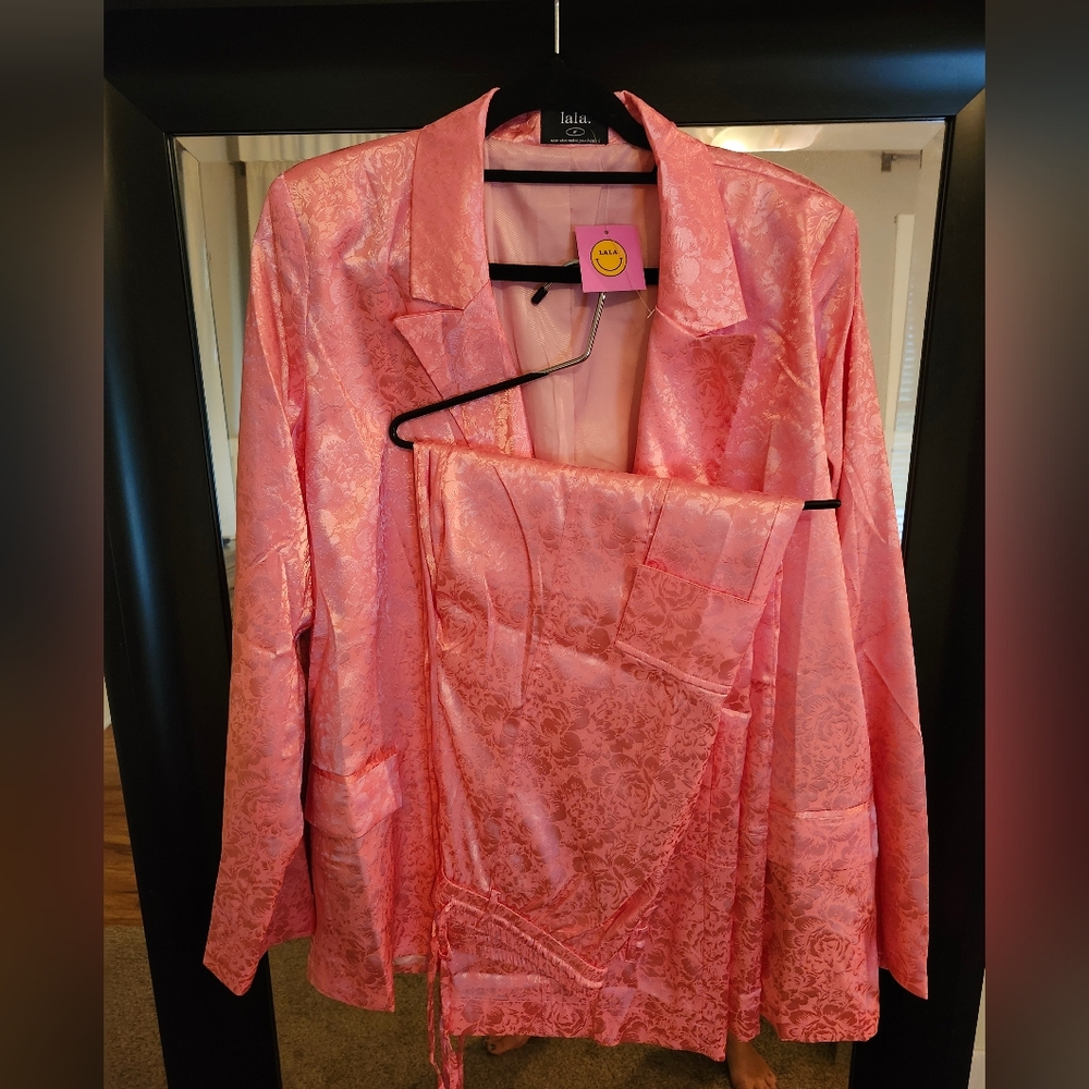 Dressed In Lala Pink Floral Suit.